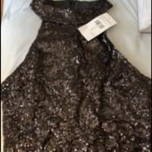 Fashion Nova top, sparkly. New with tag. Asking $10
